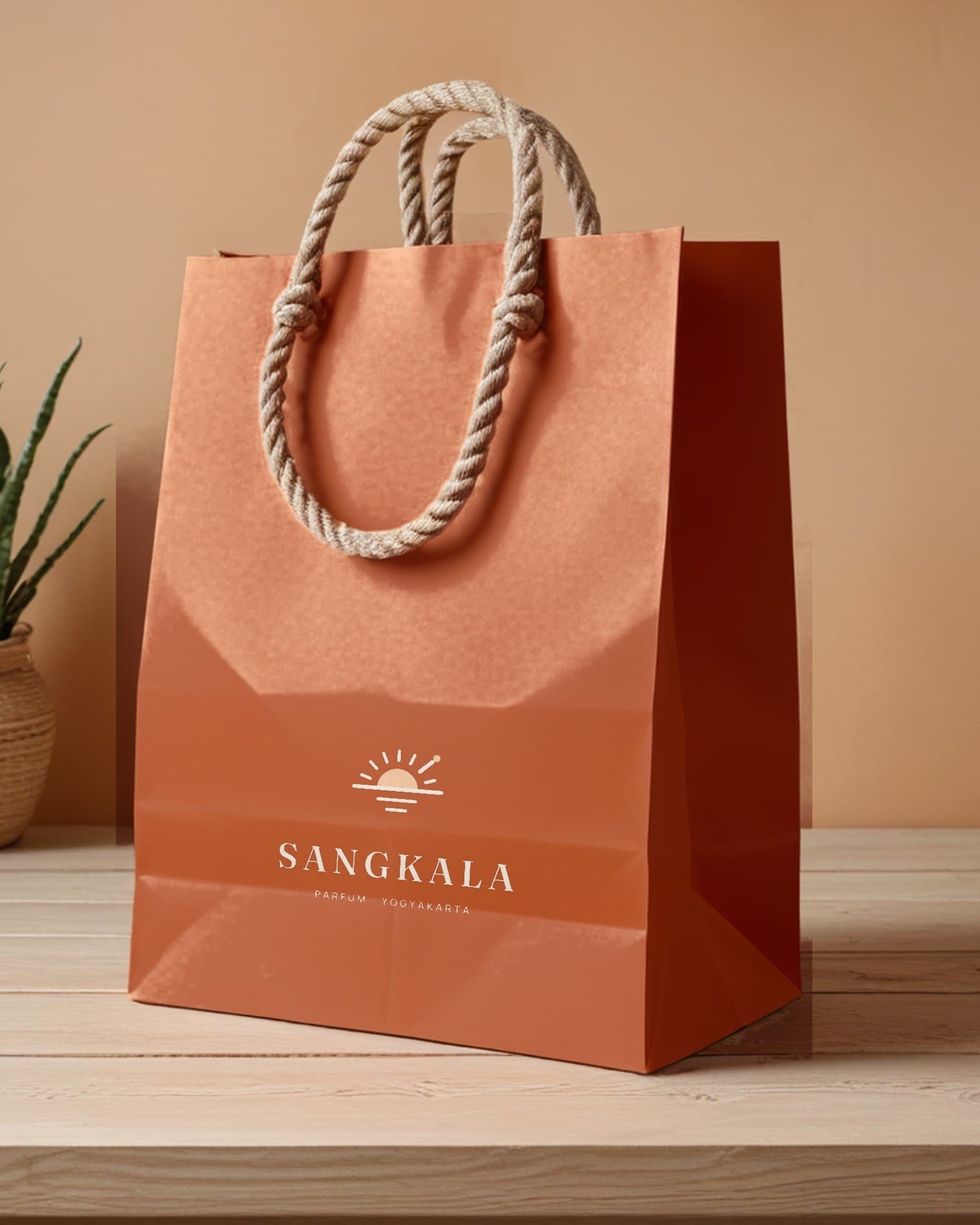 Tas kertas terakota dengan logo Sangkala